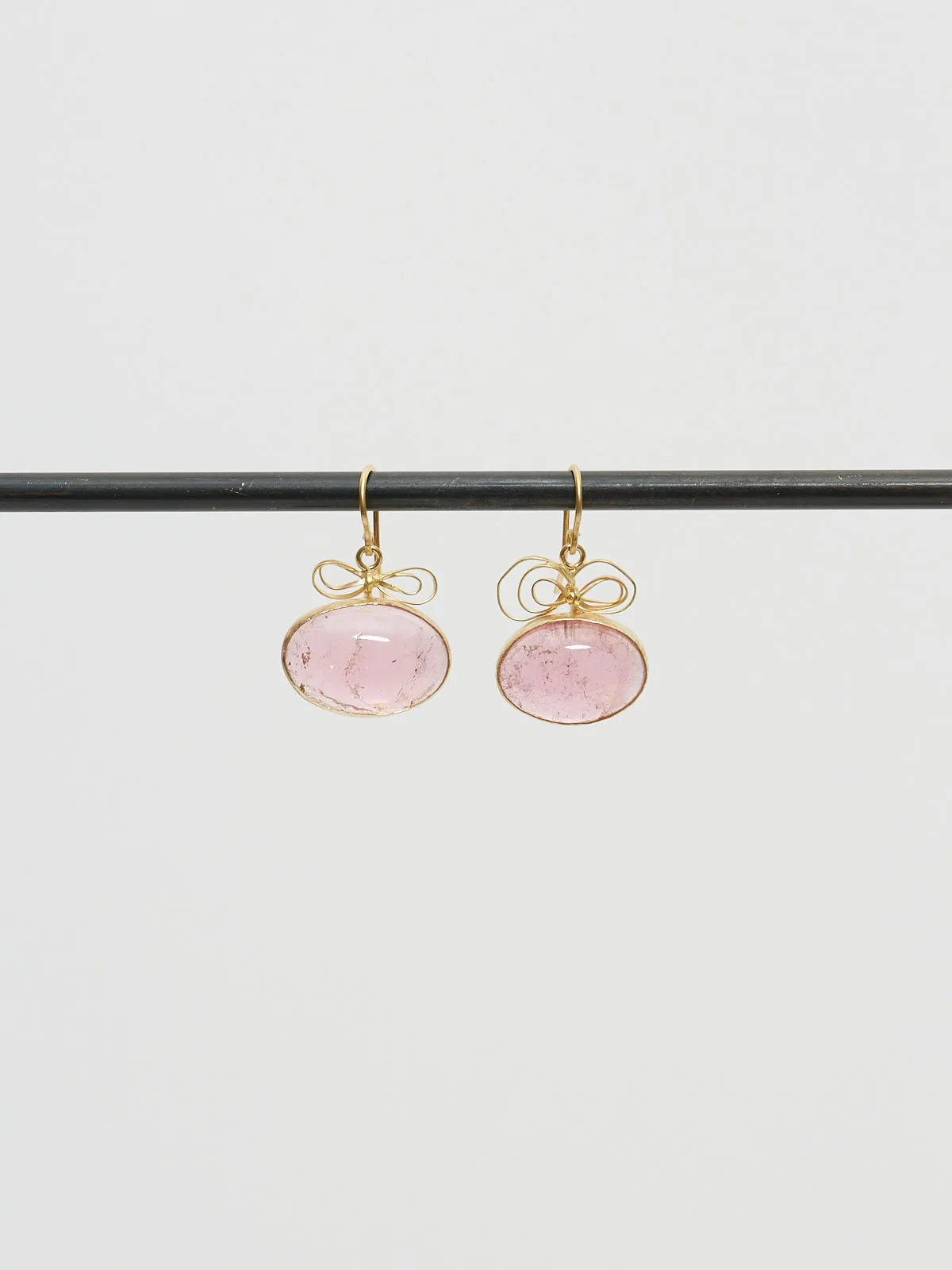 28 Carats of Pink Tourmaline Cabochons Set in Single Drop Earrings with Bow Tops in 18k Yellow Gold